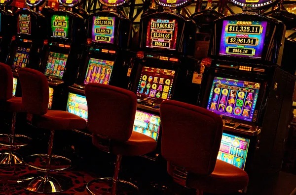 Dealer at tilt Reactoonz studio conducting live roulette spin with table overview